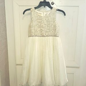 Little girl creme colored dress with gold accents. Size 10 & 8
